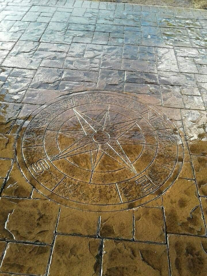 Decorative stamped concrete with compass design
