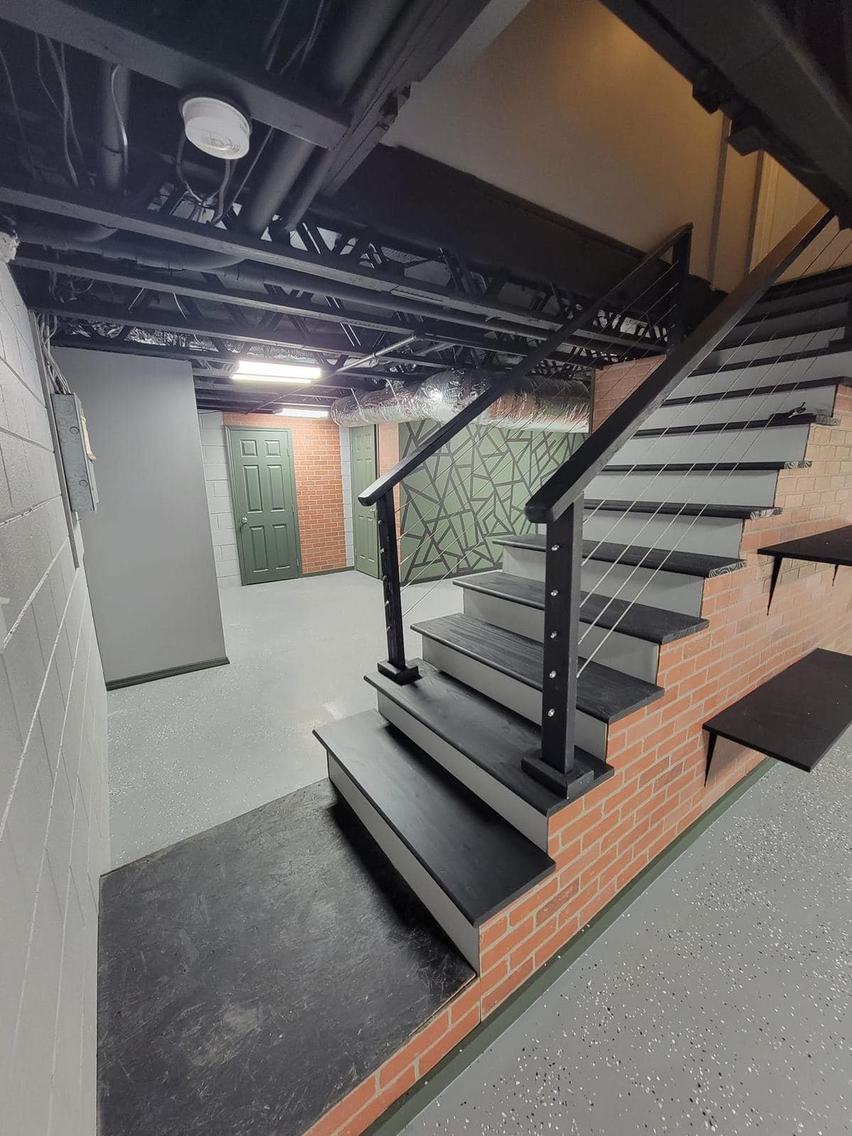 Custom staircase remodel with steel and glass railing