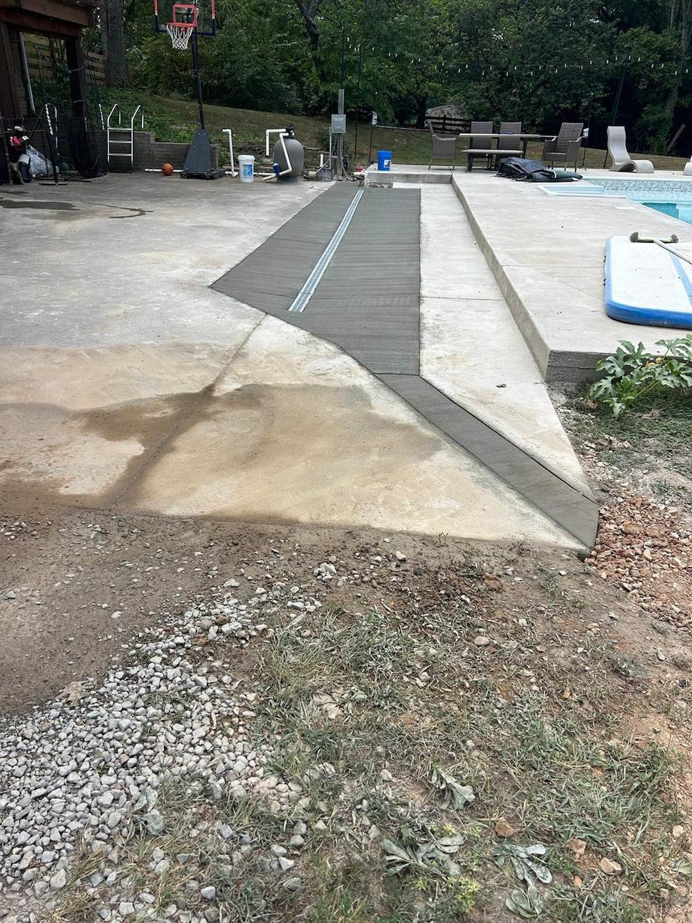 Concrete walkway leading to a home